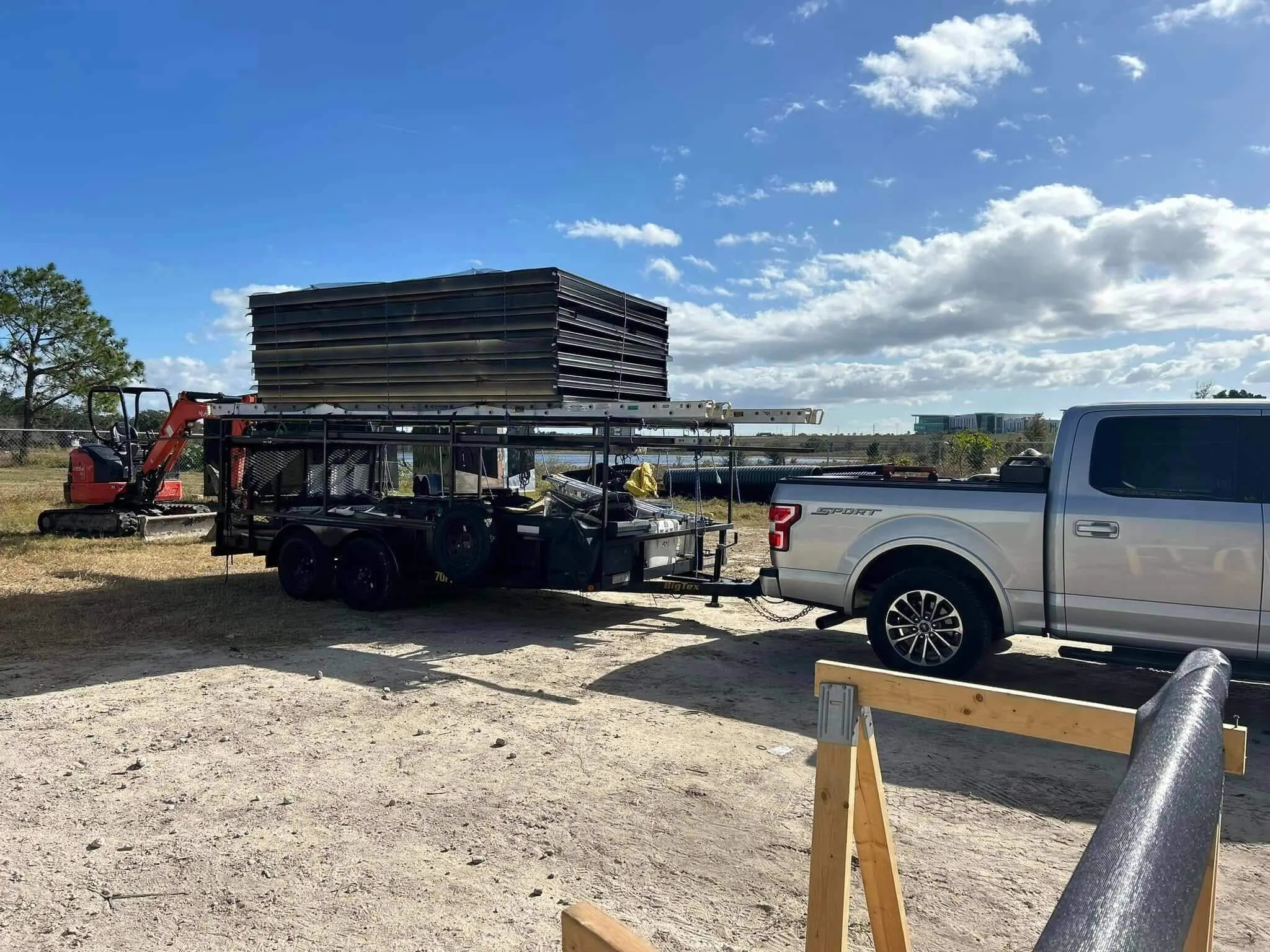 finished pool cage enclosure covering backyard swimming pool