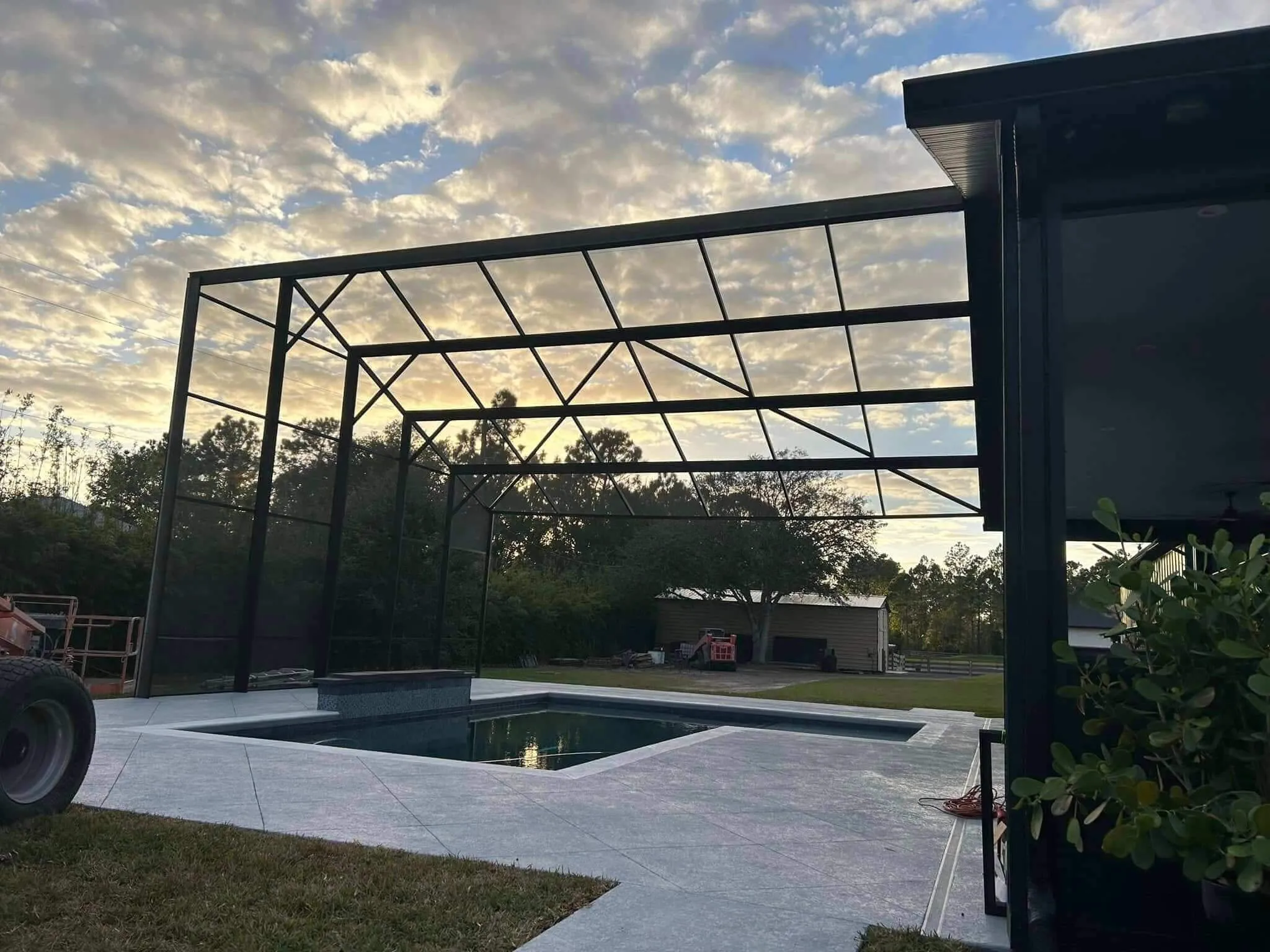 custom built aluminum screen enclosure at residential backyard