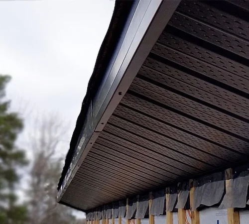Weather resistant soffit and fascia installed on house exterior