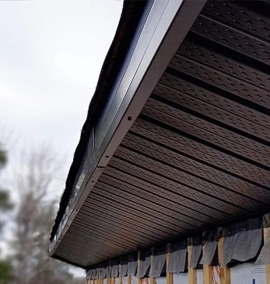 Weather resistant soffit and fascia installed on house exterior